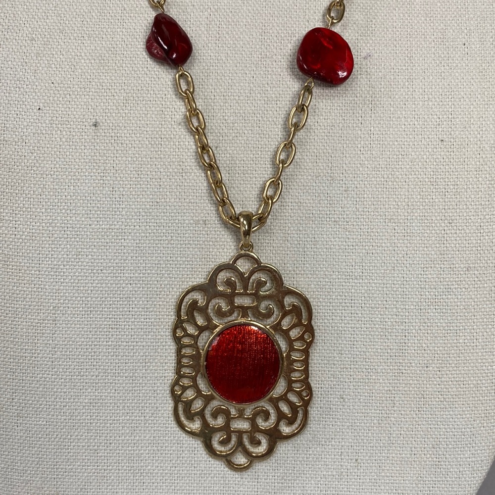 Long unique Goldtone medallion style necklace